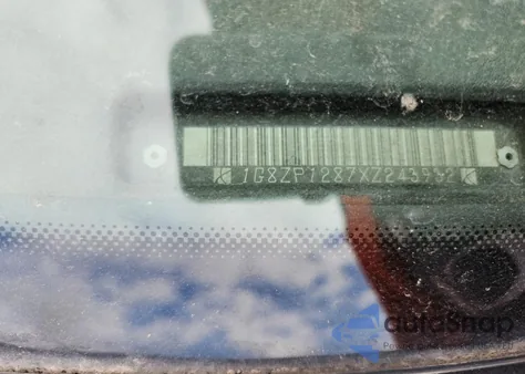 1999 Saturn Sc1 z USA, uszkodzony, nr VIN 1G8ZP1287XZ243932